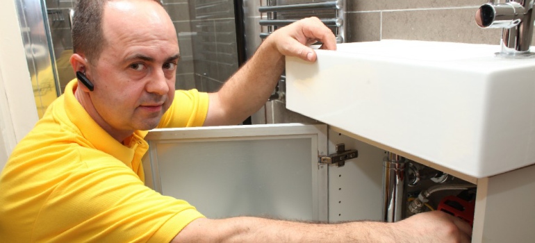 Local trustworthy plumber resolving customer's plumbing issues